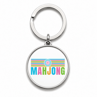Round Mahjong keychain that says Mahjong with rainbow stripes