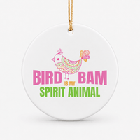 Round ceramic Mahjong ornament that says Bird Bam spirit animal with a bird