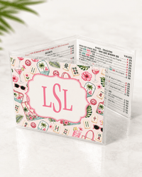Clear mahjong card holder with a personalized insert in a pink floral mahjong tile pattern and an LSL monogram frame