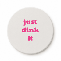 Round ceramic pickleball coaster that says just dink it in pink