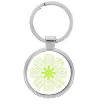 Round pickleball keychain with green pickleball paddle flower design