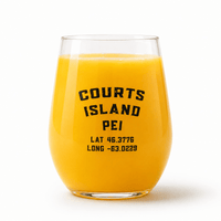 Stemless acrylic wine glass with Courts Island PEI lettering and coordinates, filled with an orange drink